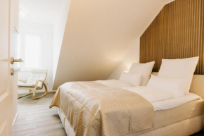 Küsten Suite de Diek - Suite 2 direkte Deichlage, Hafenblick, Balkon, 77qm